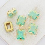 8.5x11 mm rectangle glass cabochon Pacific Opal AB with gold-colored claw x 6 pc(s)