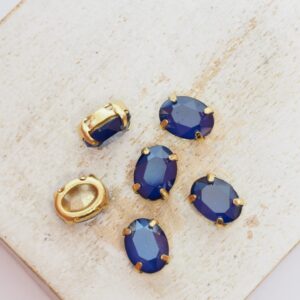 6x8 mm oval glass cabochon Capri Blue Matt with gold-colored claw x 6 pc(s)