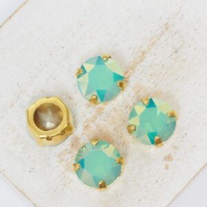 10 mm round glass cabochon Pacific Opal AB with gold-colored claw x 4 pc(s)