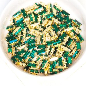 3x7 mm Preciosa Fancy Baguette Emerald with Gold-colored claw x 10 pc(s)