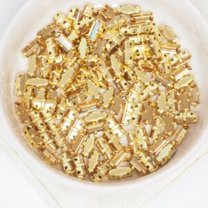 3x7 mm Preciosa Fancy Baguette Light Colorado Topaz with Gold-colored claw x 10 pc(s)