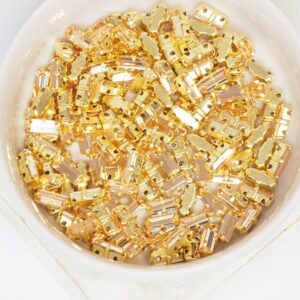 3x7 mm Preciosa Fancy Baguette Light Peach with Gold-colored claw x 10 pc(s)