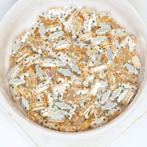 3x7 mm Preciosa Fancy Baguette Light Peach with Silver-colored claw x 10 pc(s)