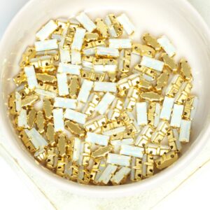 3x7 mm Preciosa Fancy Baguette White Opal with Gold-colored claw x 10 pc(s)