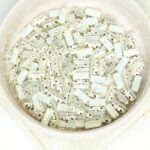 3x7 mm Preciosa Fancy Baguette White Opal with Silver-colored claw x 10 pc(s)