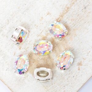 6x8 mm Preciosa Fancy Oval Cabochon Crystal AB in Silver-colored setting x 6 pc(s)