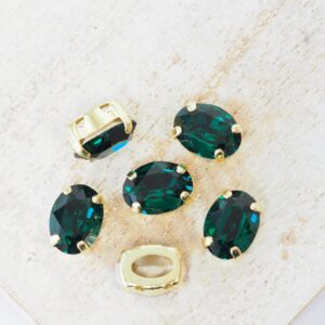 6x8 mm Preciosa Fancy Oval Cabochon Emerald in Gold-colored setting x 6 pc(s)