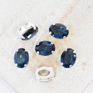 6x8 mm Preciosa Fancy Oval Cabochon Montana in Silver-colored setting x 6 pc(s)