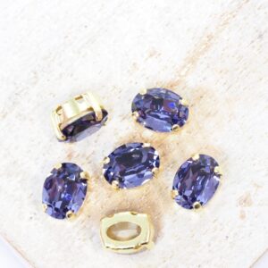 6x8 mm Preciosa Fancy Oval Cabochon Tanzanite in Gold-colored setting x 6 pc(s)