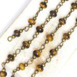 Decoration Chain with Flat Tigers Eye beads Antique bronze x 1 m