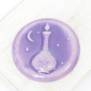 36 mm The Spyโs Elixir Beadingschool Art Cabochon Mauve on light clay x 1 pc(s)