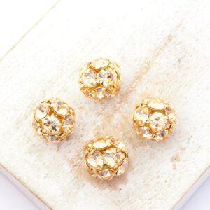 10 mm Preciosa fancy ball bead Light Peach in Gold-colored setting x 4 pc(s)